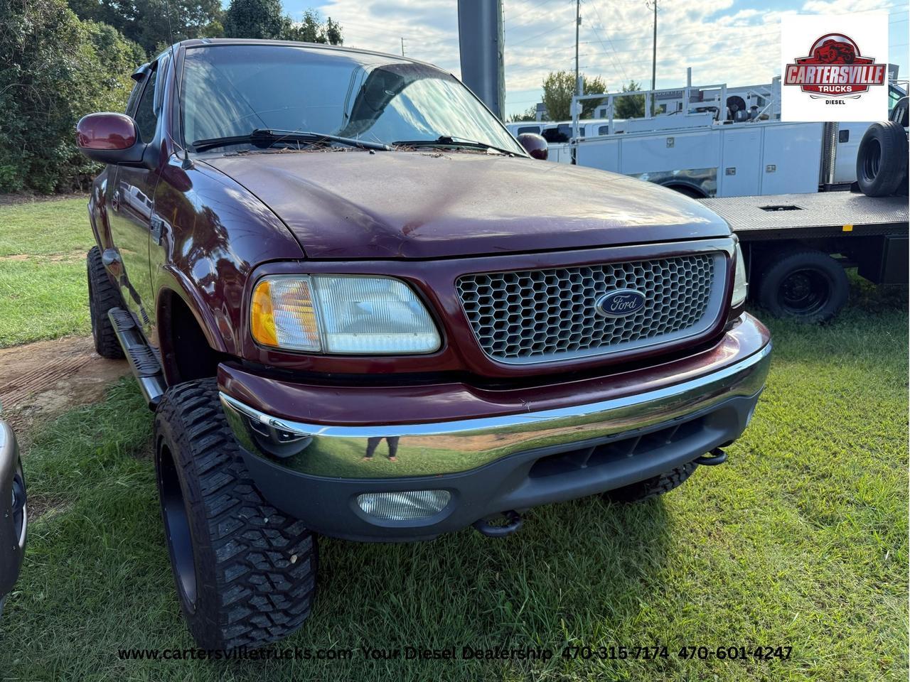 1999 Ford F150 XLT 4X4 - LIFTED  - LOW MILES