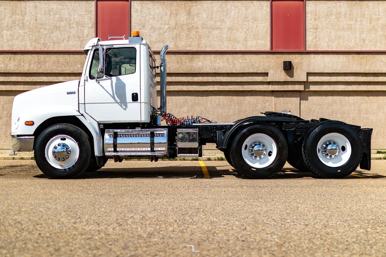 2000 Freightliner FL112 Daycab Truck/Tractor Diesel Red Deer AB