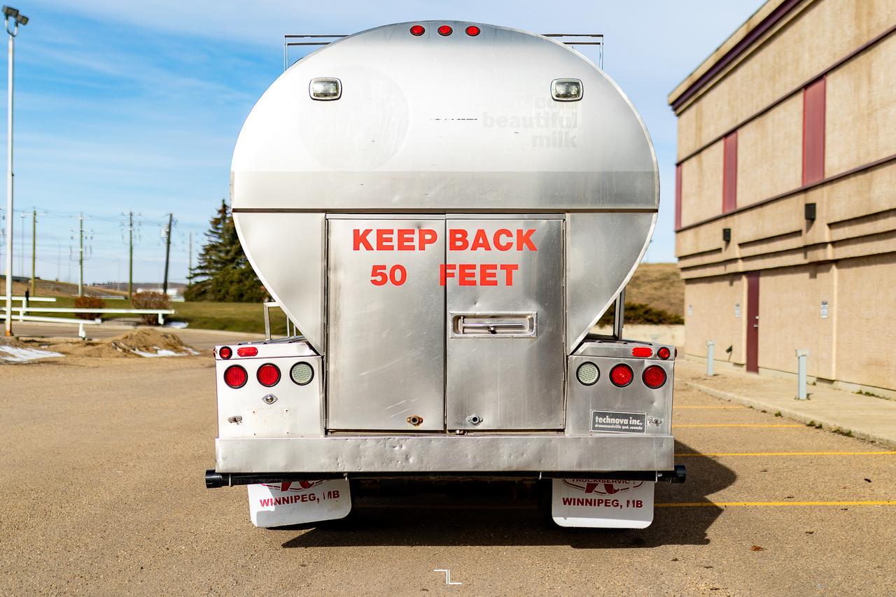 2000 Freightliner FL80 Day Cab SS Water Tanker Diesel Red Deer AB