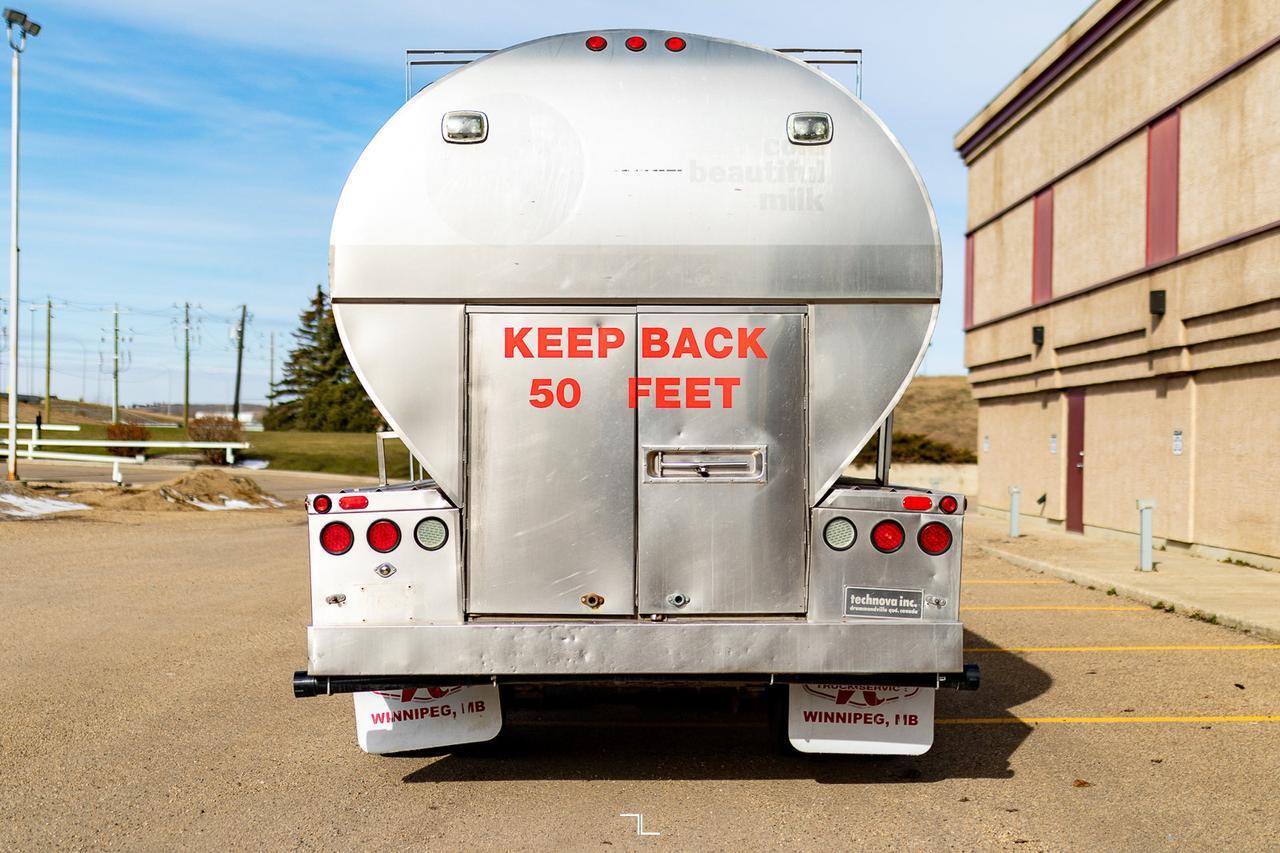 2000 Freightliner FL80 Day Cab SS Water Tanker Diesel Red Deer AB