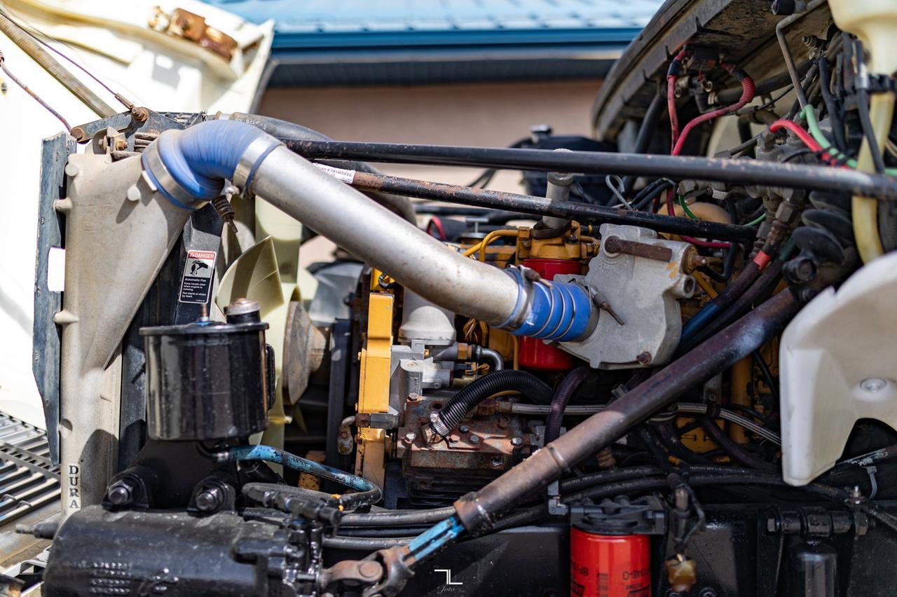 2001 Freightliner FL80 4x4 Auger/Drill Derrick Truck Red Deer AB