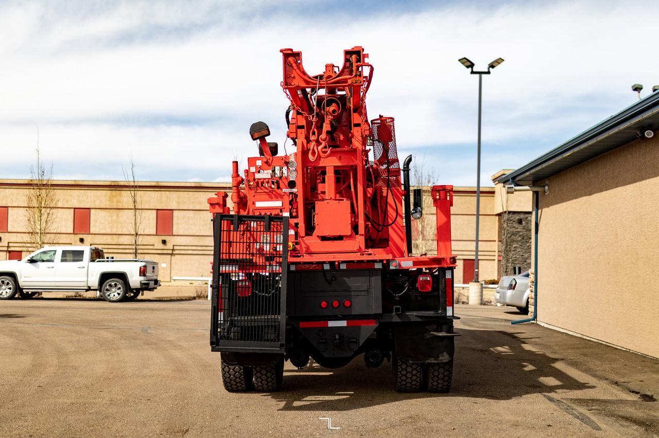 2001 Freightliner FL80 4x4 Auger/Drill Derrick Truck Red Deer AB