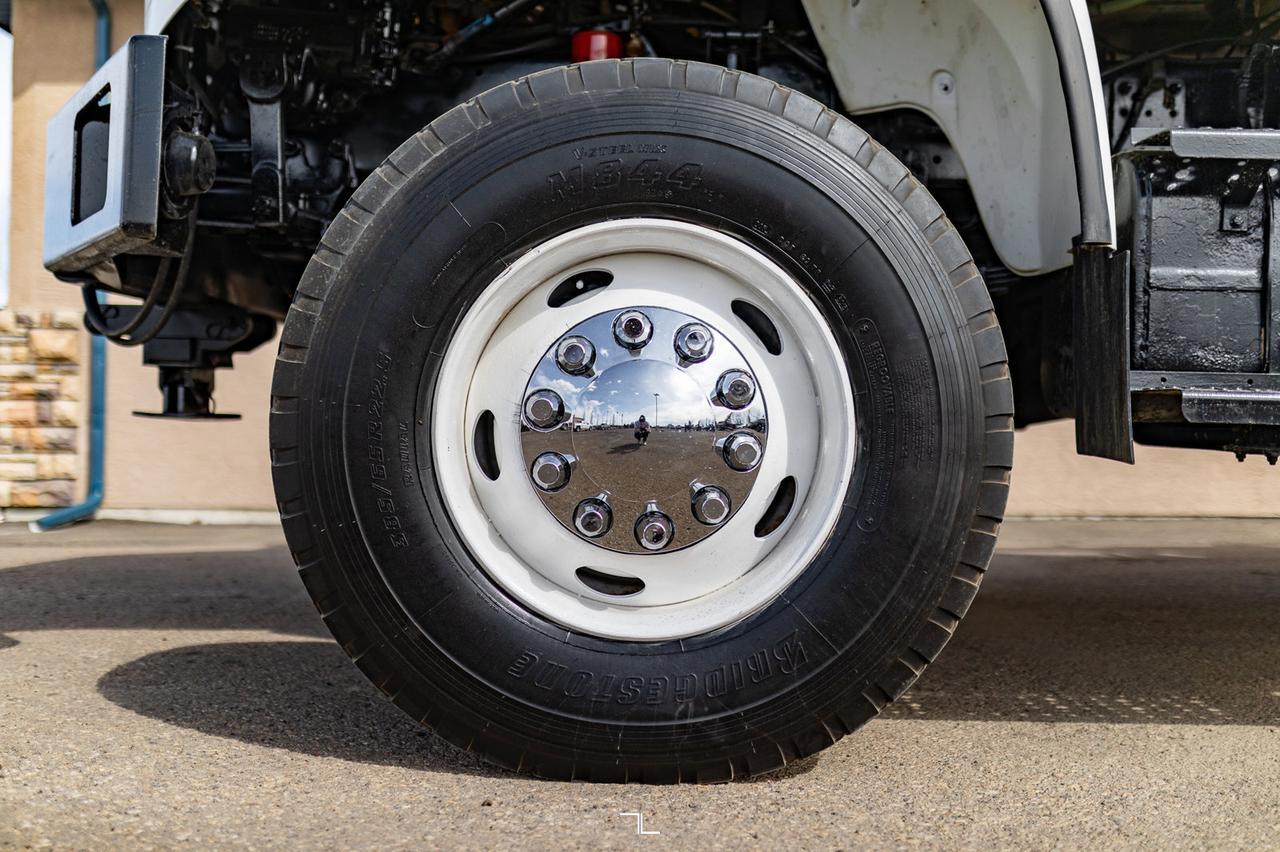 2001 Freightliner FL80 4x4 Auger/Drill Derrick Truck Red Deer AB