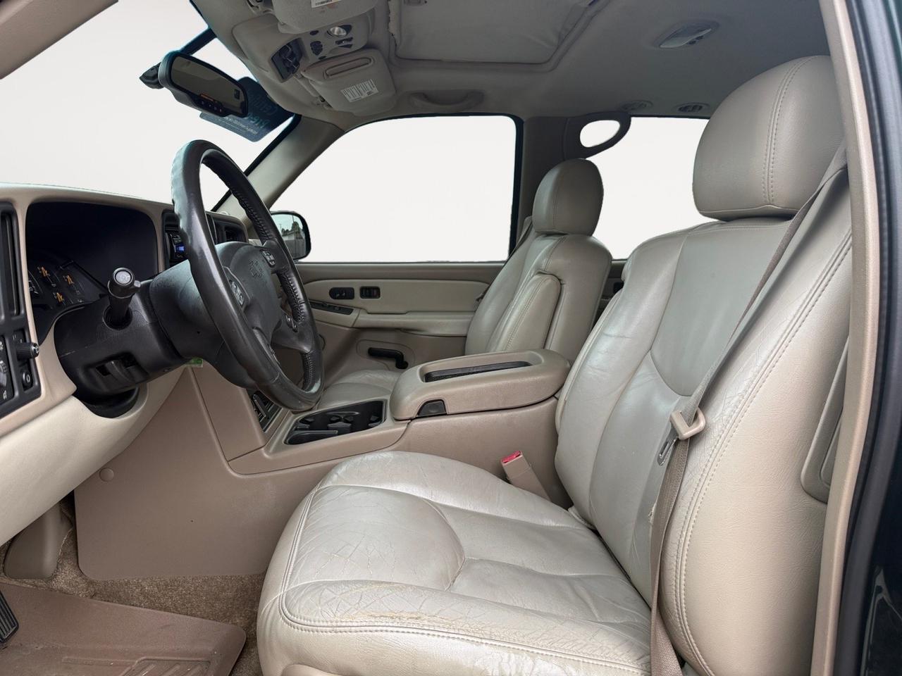2003 Chevrolet Tahoe LT, HEATED SEATS, CAPTAINS CHAIRS, 3RD ROW, BOSE SPEAKERS, RUNNING BOARDS, TOW PACKAGE, ROOF RACKS, POWER MIRRORS, SUNROOF, UNIVERSAL GARAGE DOOR OPENER, LOW MILES, THIS IS THE PERFECT FAMILY VEHICLE FOR A PERFECT PRICE!