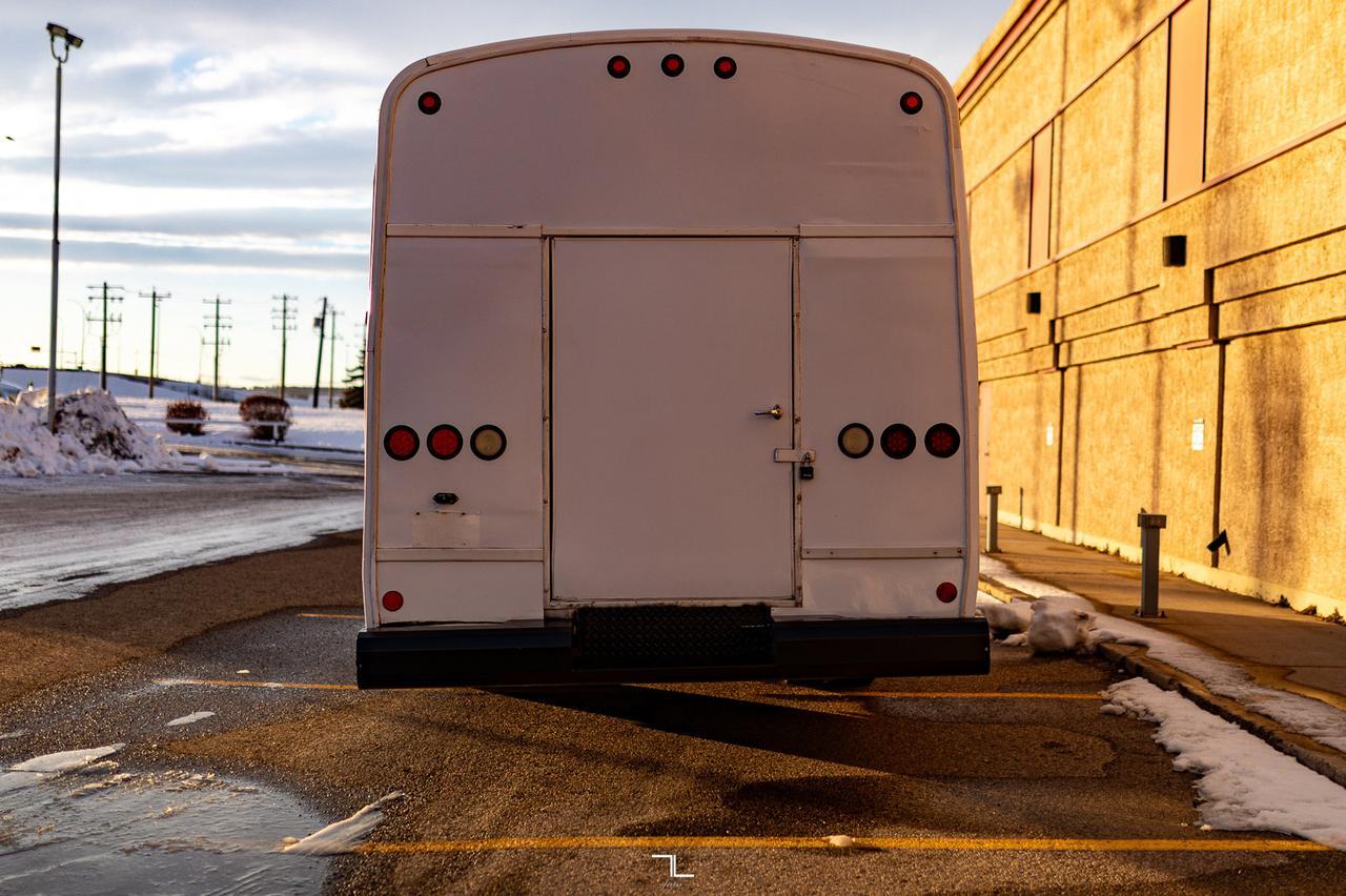 2003 GMC C5500 24 Passenger 30 Ft.Van Diesel Red Deer AB