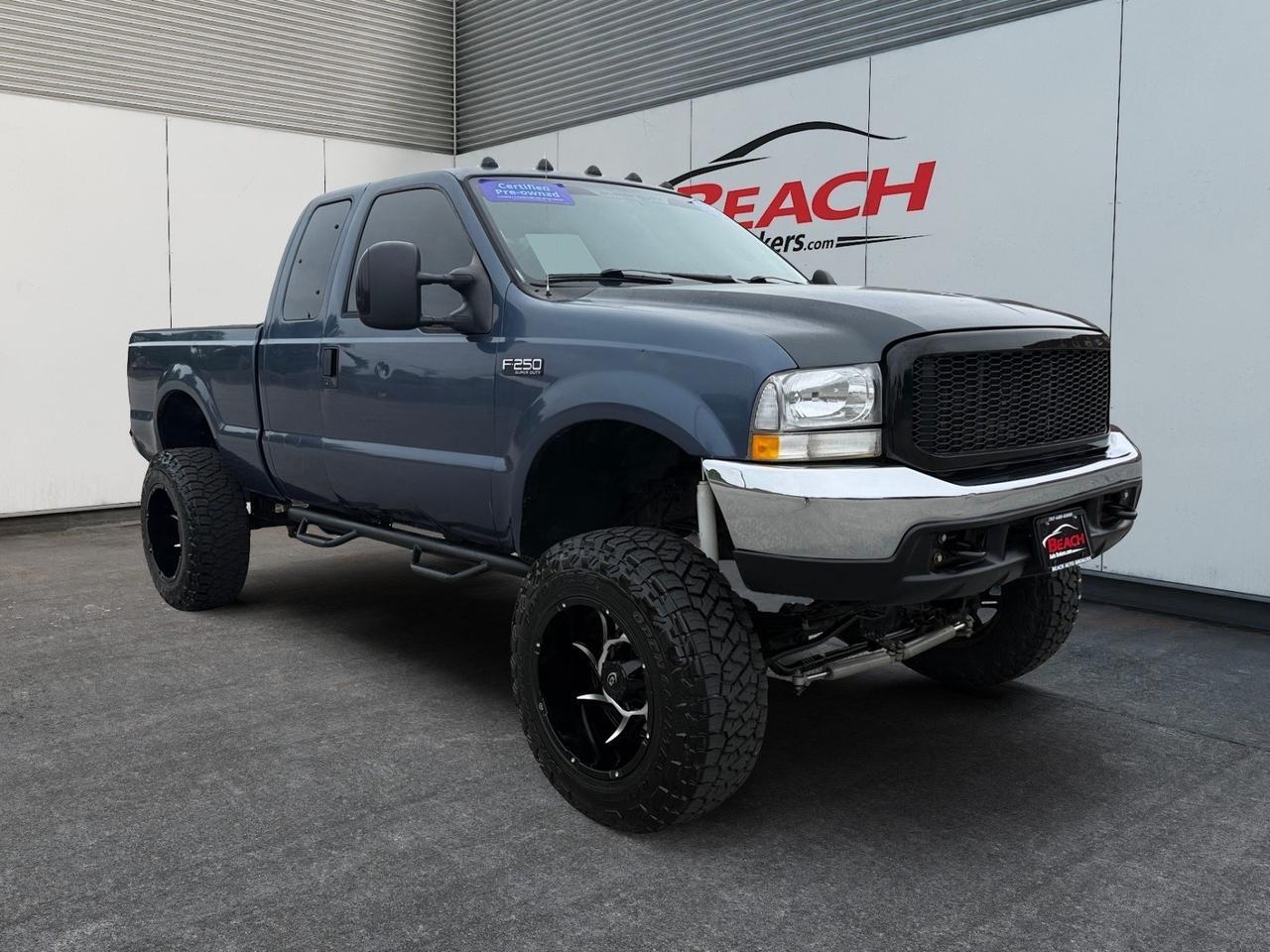 2004 Ford Super Duty F-250 XLT, BACKUP CAMERA, STEERING WHEEL CONTROLS, TAILGATE STEP, RUNNING BOARDS, TOW PACKAGE, POWER MIRRORS, ALL WEATHER FLOOR MATS, AUX, ADJUSTABLE PETALS, OLD BUT COULD BE NEW TO YOU!