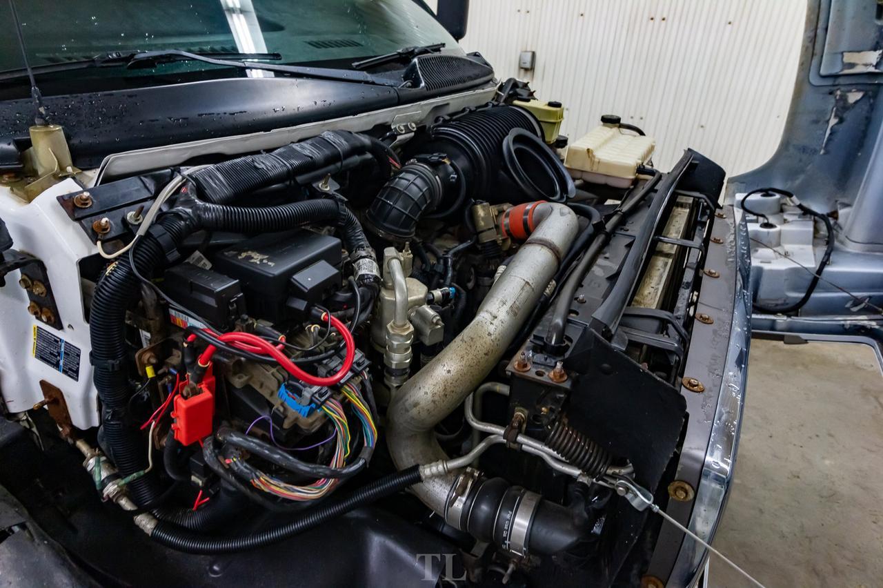 2005 GMC TC5500 4x4 Reg Cab Deck Diesel Red Deer AB