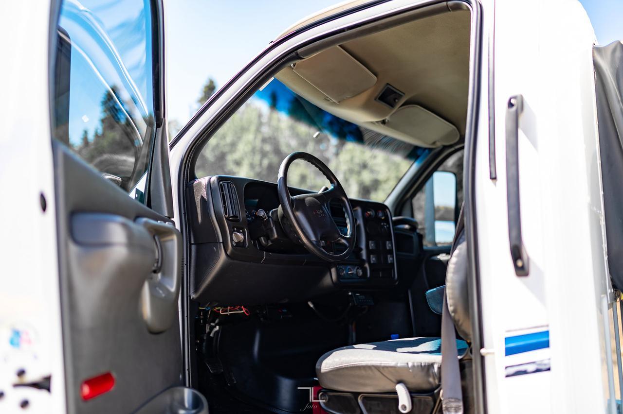 2006 GMC TC5500 4x4 Reg Cab Dually Deck Sleeper Diesel Red Deer AB