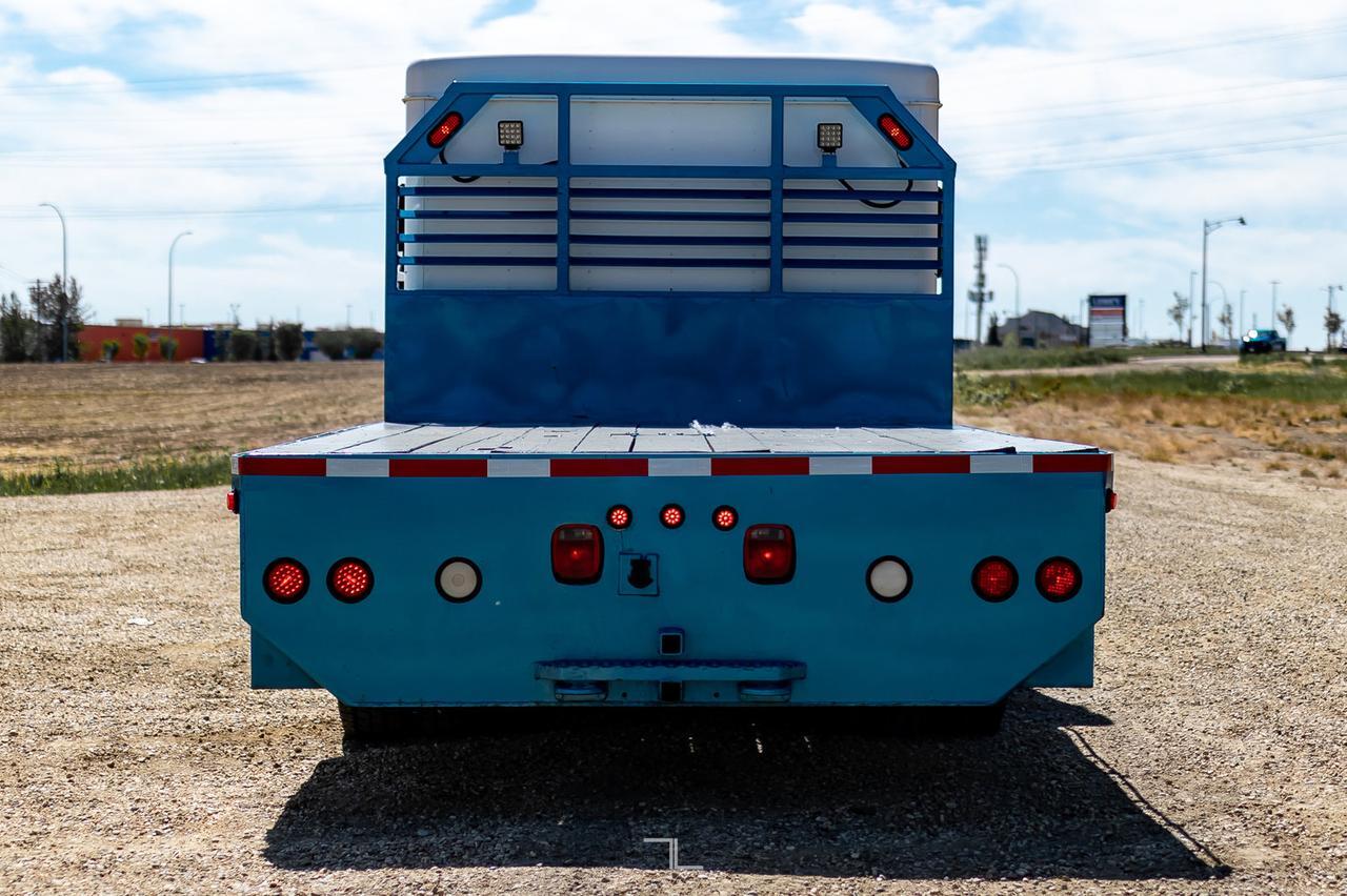 2006 GMC TC5500 4x4 Reg Cab Dually Deck Sleeper Diesel Red Deer AB