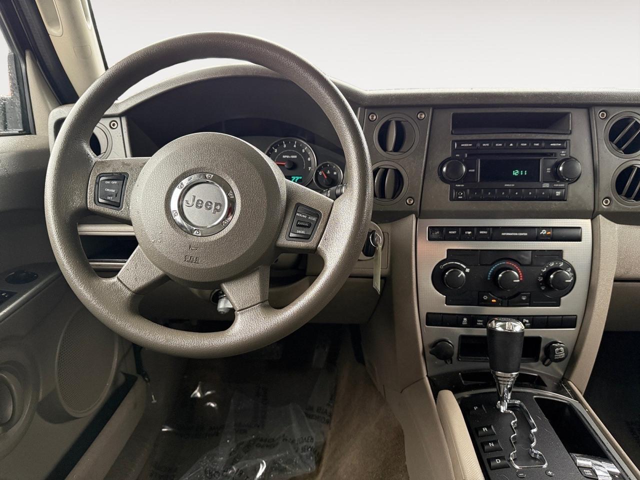 2007 Jeep Commander Sport, 3RD ROW, TOW PACKAGE, FOLD AWAY MIRRORS, HEATED MIRRORS, POWER MIRRORS, TINTED GLASS, AUX, CD PLAYER, FLOOR MATS, LOW MILES, THIS JEEP IS READY FOR ITS NECT ADVENTURE!