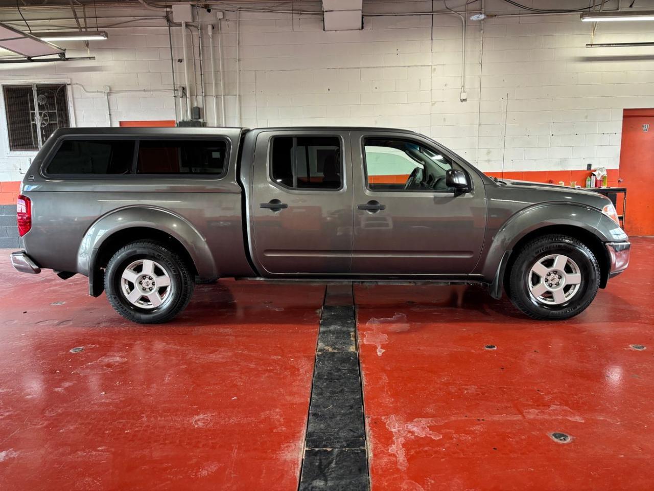 Storm Gray 2007 Nissan Frontier SE Crew Cab 4WD Pickup Truck Four-Wheel Drive Automatic