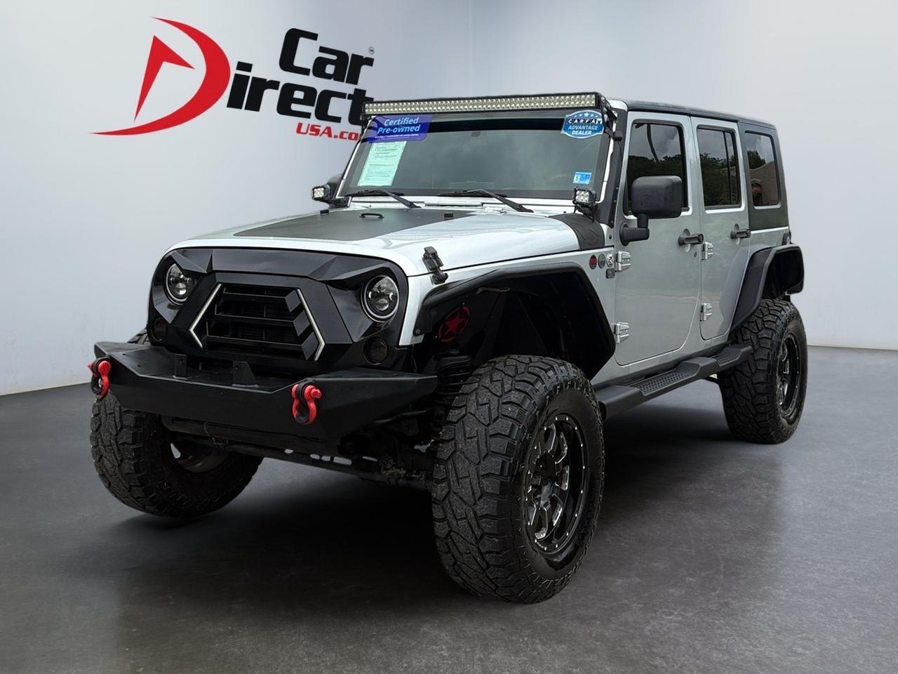 2009 Jeep Wrangler Unlimited Sahara, RUNNING BOARDS, TOW PACKAGE, BRUSH GUARD, LIGHT BAR, BACKUP CAMERA, BLUETOOTH, HARD TOP, LIFTED, METAL BUMPERS, LOW MILES, RIDE TOUGH IN THIS BIG JEEP!