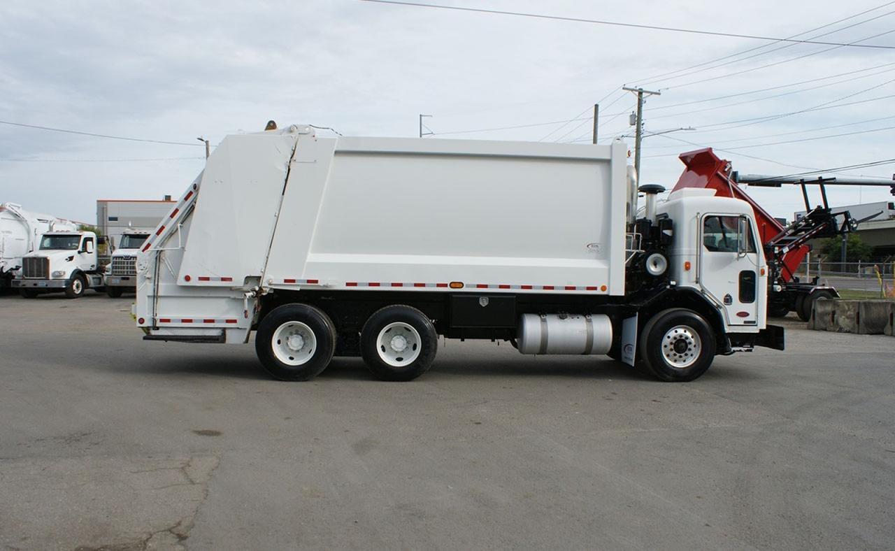 2009 Peterbilt 320 25 yard Heil Rear Loader Garbage Truck