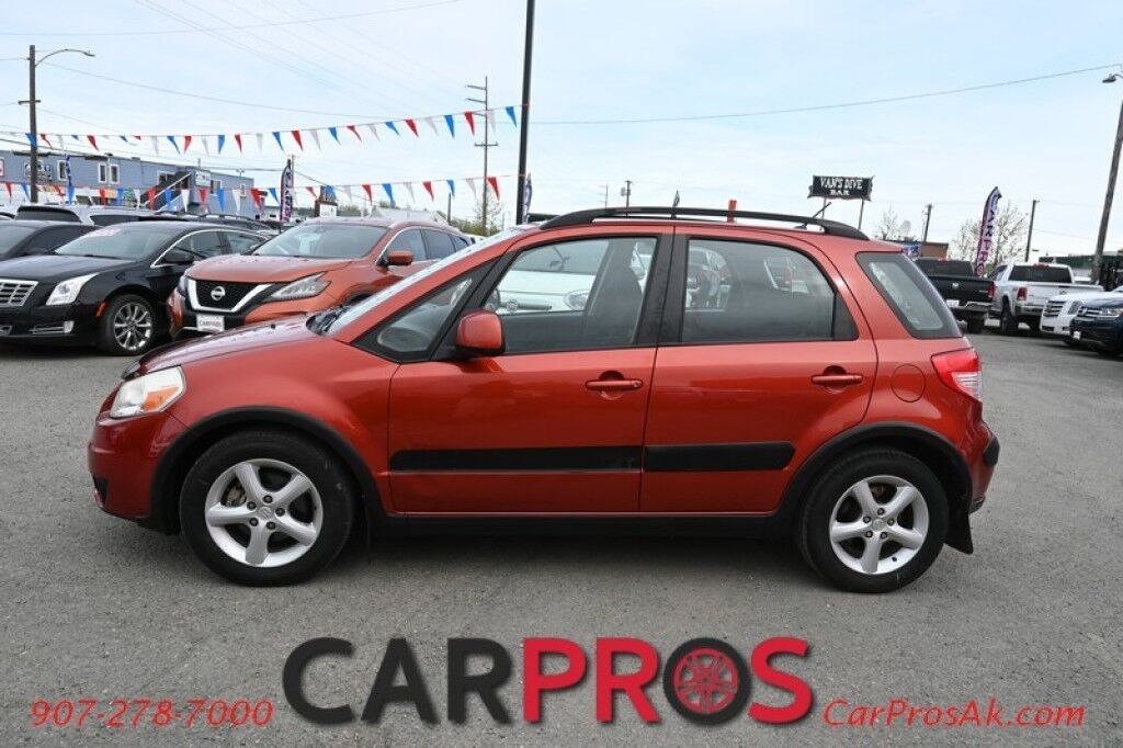 2009 Suzuki SX4 All Wheel Drive - 2.0L 4-Cyl - Automatic - Power Locks, Windows & Mirrors - Air Conditioning - AM/FM/CD - Keyless Entry - Aluminum Wheels - 28 MPG - Only 63K Miles