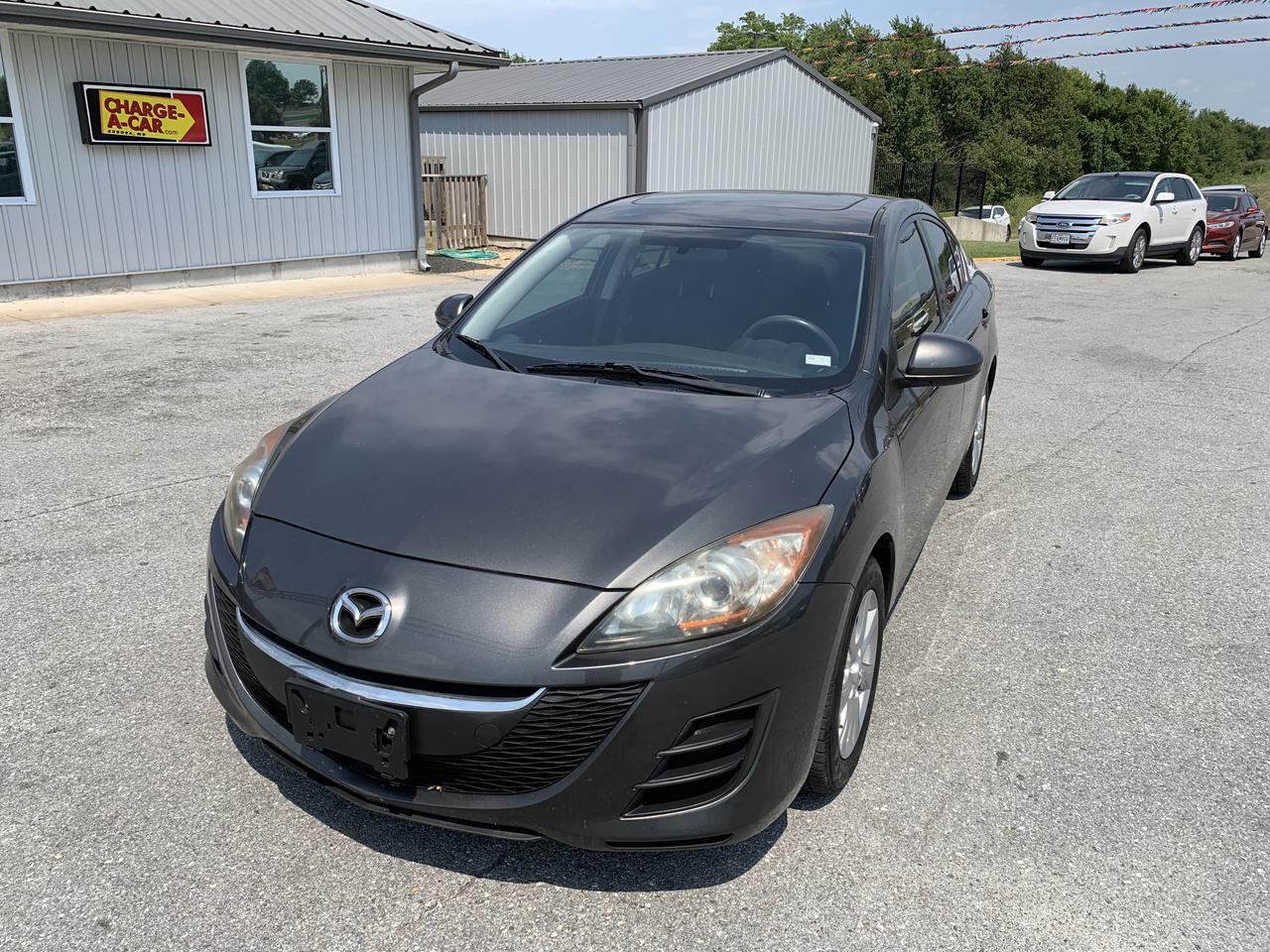 2010 MAZDA MAZDA3 i Touring Sedan 4D Aurora MO