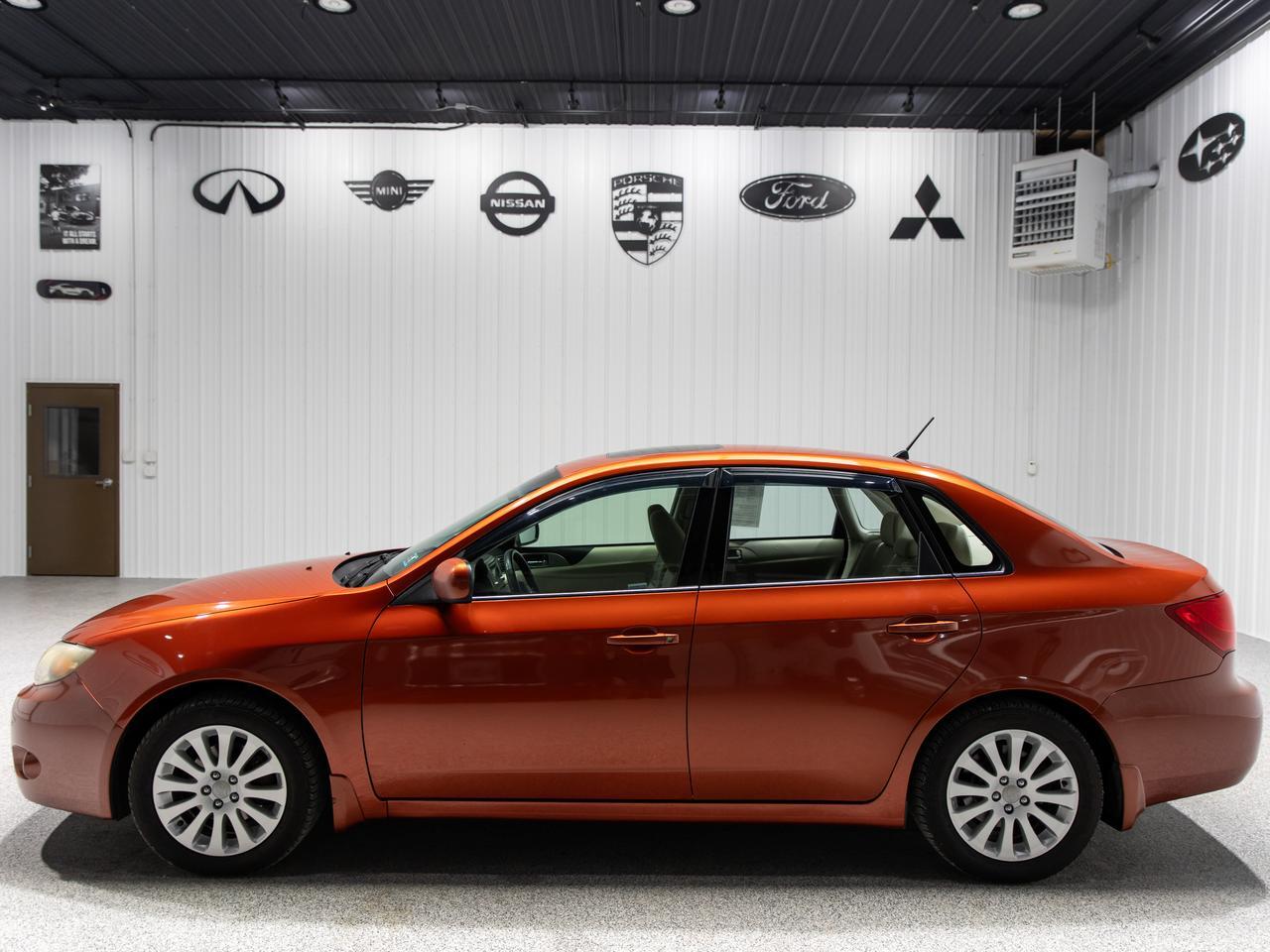 2010 Subaru Impreza 2.5i Limited photo 3