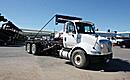 2011 International 8600 60,000 lb. Galbreath Roll-off Truck