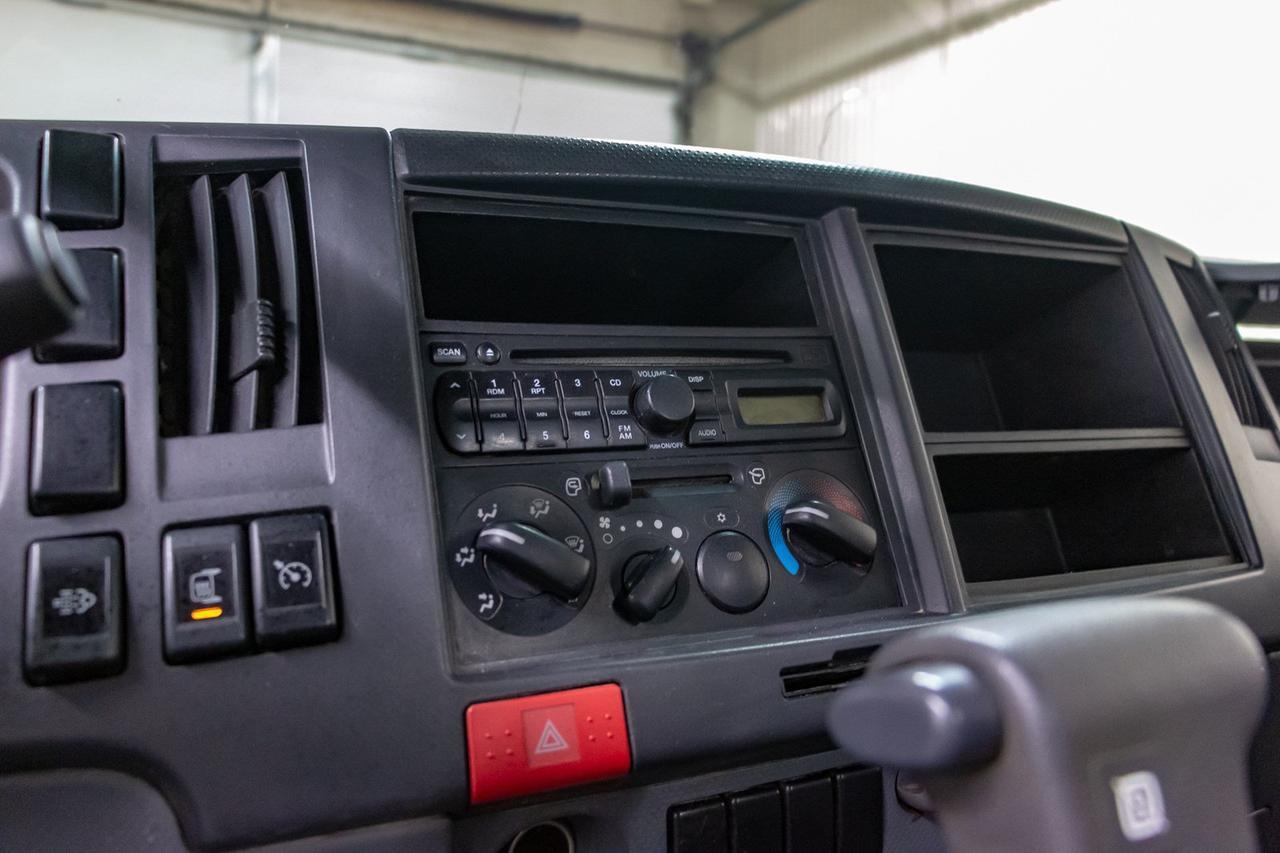 2011 Isuzu NPR HD 2 Door Tilt Cab Deck Diesel Red Deer AB
