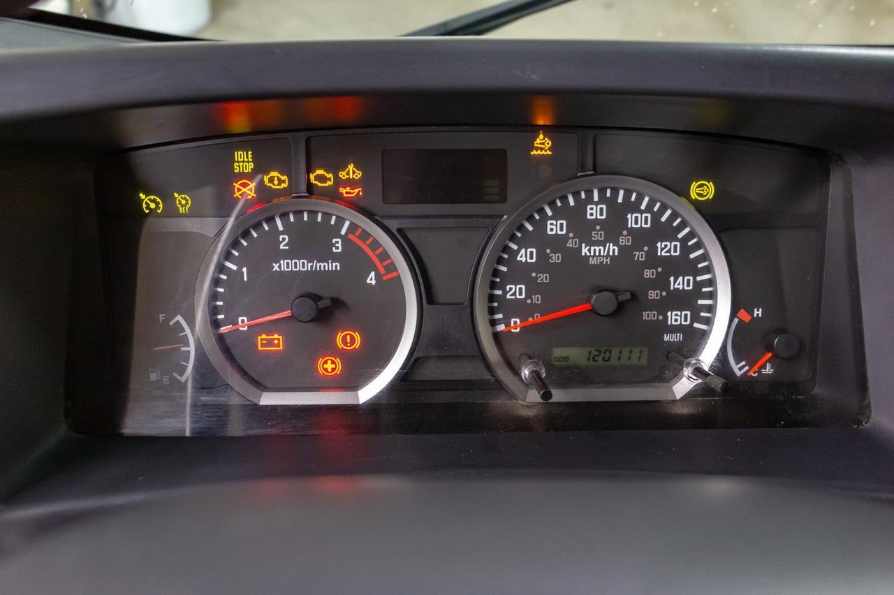 2011 Isuzu NPR HD 2 Door Tilt Cab Deck Diesel Red Deer AB