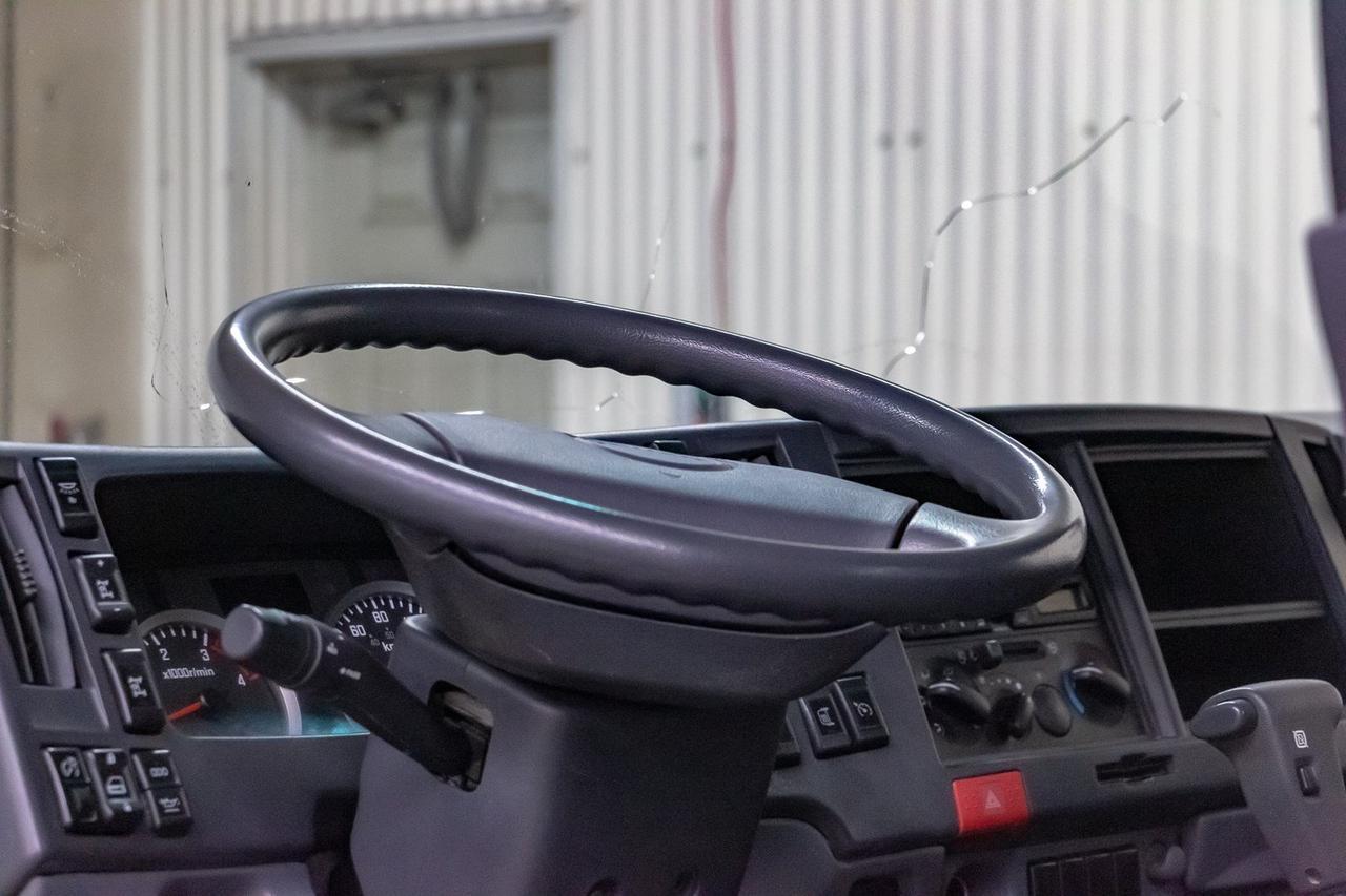 2011 Isuzu NPR HD 2 Door Tilt Cab Deck Diesel Red Deer AB