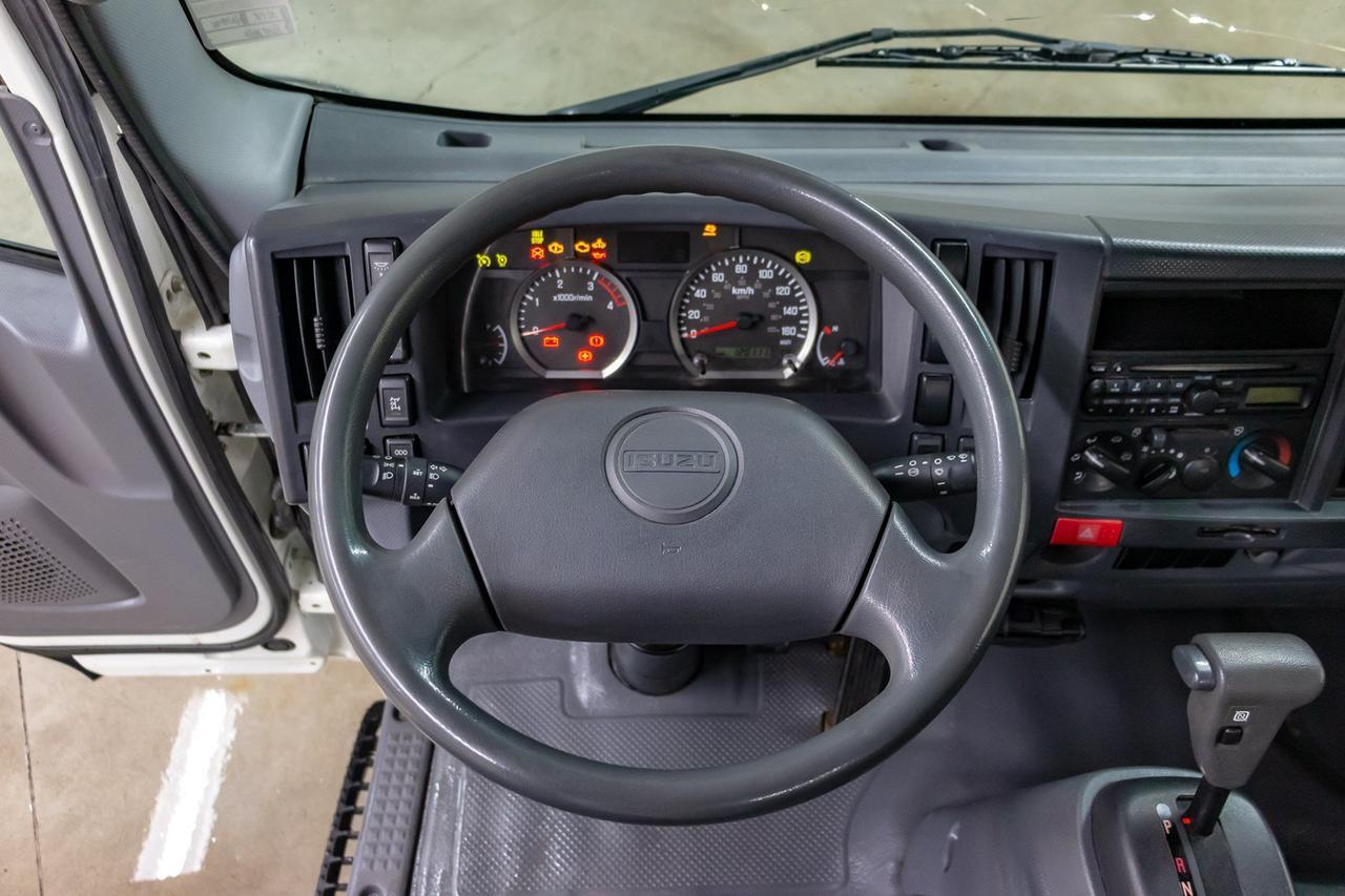 2011 Isuzu NPR HD 2 Door Tilt Cab Deck Diesel Red Deer AB