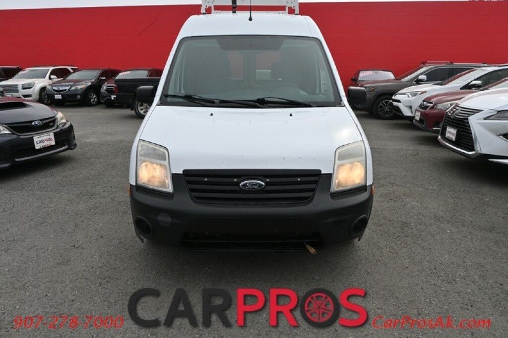 2012 Ford Transit Connect XL - 2.0L I4 Duratec - AdvanceTrac & RSC - AM/FM Radio - Built In Cargo Shelves - Vinyl Rear Flooring - Roof Mounted Utility Rack - Engine Block Heater - Low Miles