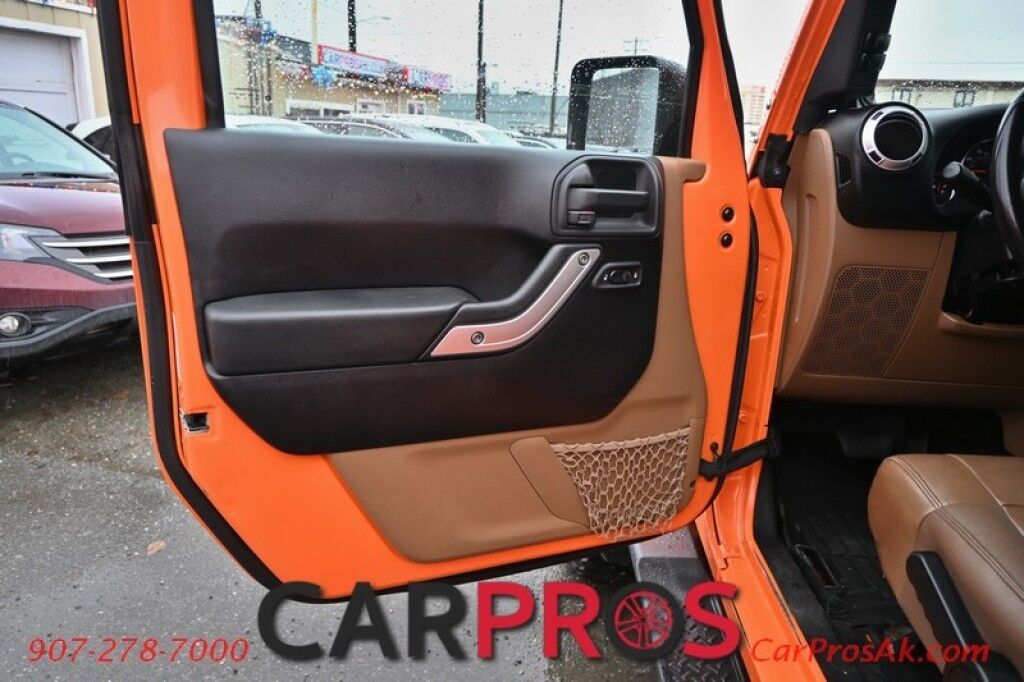 2012 Jeep Wrangler Unlimited Sahara - 4X4 - Automatic - Paint Matched Hardtop - Remote Start - Heated Leather Seats - Keyless Entry - Infinity Sound System - Navigation - Bluetooth - American Outlaw Wheels - Tow Pkg Anchorage AK