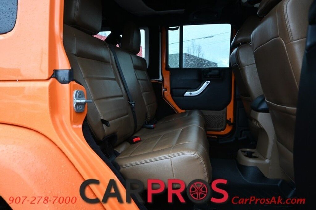 2012 Jeep Wrangler Unlimited Sahara - 4X4 - Heated Leather Seats - Remote Start - Power WIndows & Locks - Keyless Entry - Infinty Sound System - NAV - Bluetooth - Winch Ready Bumper w/ 20 Lightbar - Color Matched Hard Top - American Outlaw Wheels - Tow Pkg Anchorage AK