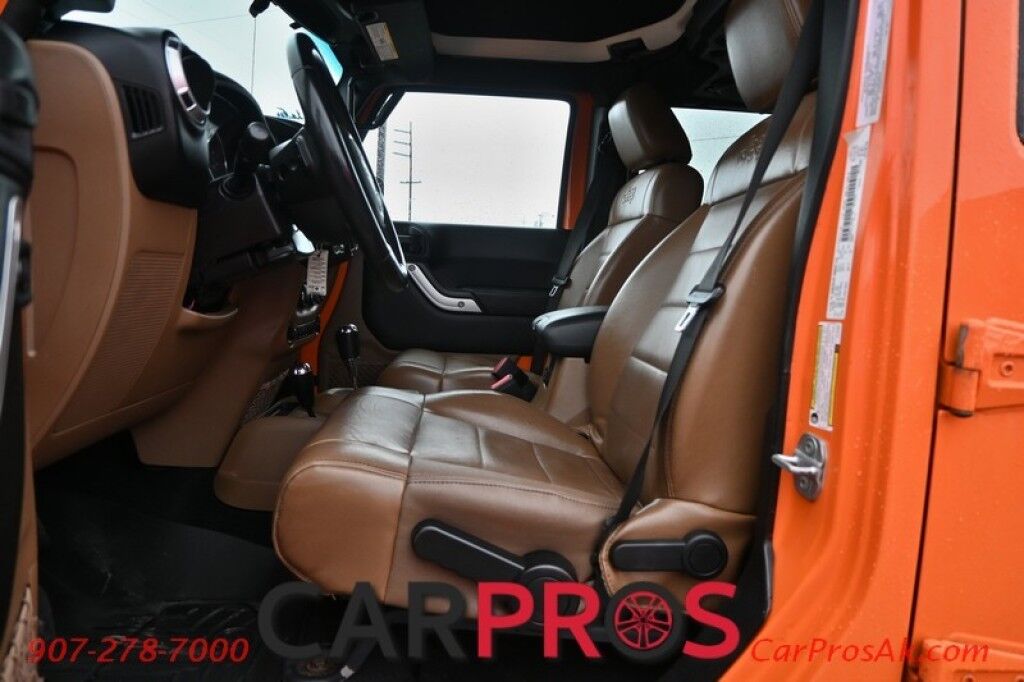 2012 Jeep Wrangler Unlimited Sahara - 4X4 - Heated Leather Seats - Remote Start - Power WIndows & Locks - Keyless Entry - Infinty Sound System - NAV - Bluetooth - Winch Ready Bumper w/ 20 Lightbar - Color Matched Hard Top - American Outlaw Wheels - Tow Pkg Anchorage AK