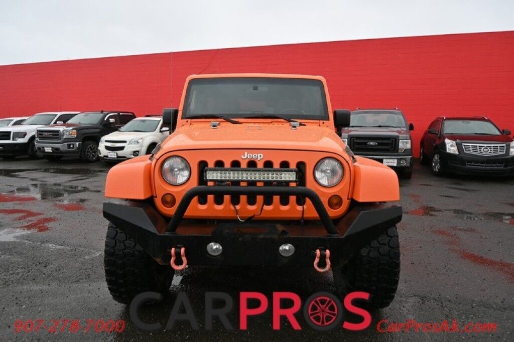 2012 Jeep Wrangler Unlimited Sahara - 4X4 - Heated Leather Seats - Remote Start - Power WIndows & Locks - Keyless Entry - Infinty Sound System - NAV - Bluetooth - Winch Ready Bumper w/ 20 Lightbar - Color Matched Hard Top - American Outlaw Wheels - Tow Pkg
