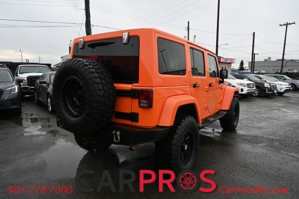 2012 Jeep Wrangler Unlimited Sahara - 4X4 - Heated Leather Seats - Remote Start - Power WIndows & Locks - Keyless Entry - Infinty Sound System - NAV - Bluetooth - Winch Ready Bumper w/ 20 Lightbar - Color Matched Hard Top - American Outlaw Wheels - Tow Pkg Anchorage AK