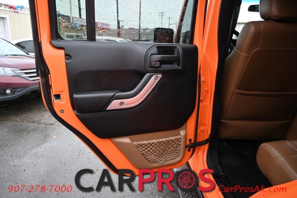 2012 Jeep Wrangler Unlimited Sahara - 4X4 - Heated Leather Seats - Remote Start - Power WIndows & Locks - Keyless Entry - Infinty Sound System - NAV - Bluetooth - Winch Ready Bumper w/ 20 Lightbar - Color Matched Hard Top - American Outlaw Wheels - Tow Pkg Anchorage AK