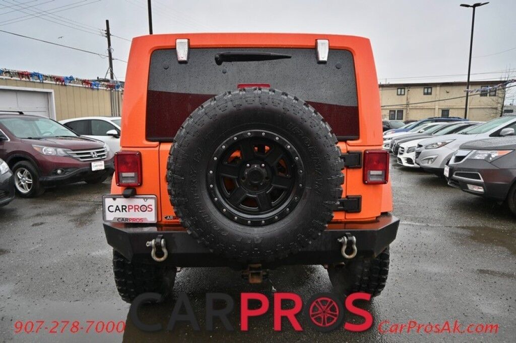 2012 Jeep Wrangler Unlimited Sahara - 4X4 - Heated Leather Seats - Remote Start - Power WIndows & Locks - Keyless Entry - Infinty Sound System - NAV - Bluetooth - Winch Ready Bumper w/ 20 Lightbar - Color Matched Hard Top - American Outlaw Wheels - Tow Pkg Anchorage AK