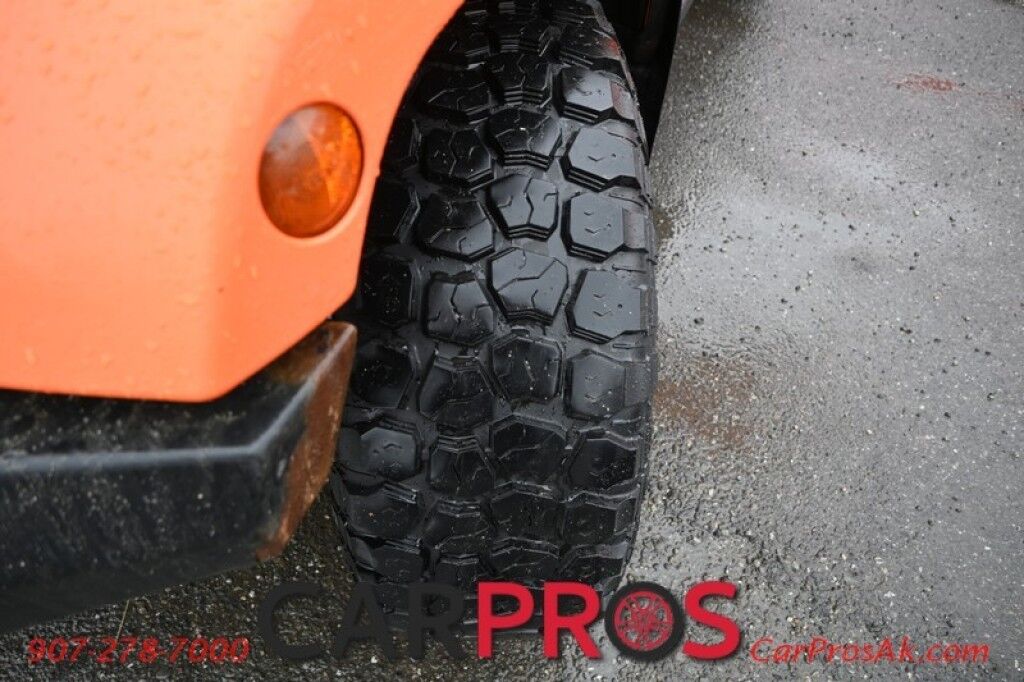2012 Jeep Wrangler Unlimited Sahara - 4X4 - Heated Leather Seats - Remote Start - Power WIndows & Locks - Keyless Entry - Infinty Sound System - NAV - Bluetooth - Winch Ready Bumper w/ 20 Lightbar - Color Matched Hard Top - American Outlaw Wheels - Tow Pkg Anchorage AK