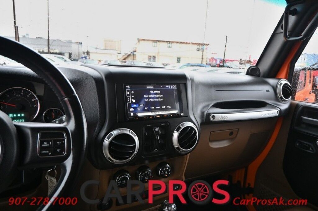 2012 Jeep Wrangler Unlimited Sahara - 4x4 - Remote Start - 3.6L V6 - Leather & Heated Seats - Power WIndows & Locks - Keyless Entry - Infinty Sound System - NAV - Bluetooth - Winch Ready Bumper w/ 20 Lightbar - Color Matched Hard Top - American Outlaw Wheels - Tow Pkg Anchorage AK