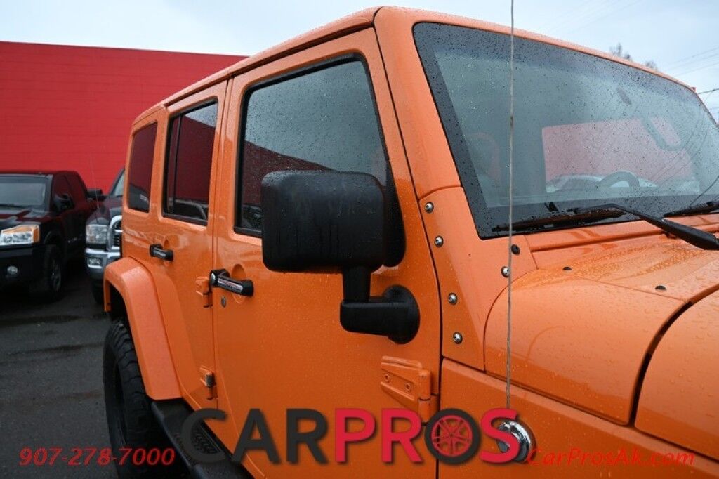 2012 Jeep Wrangler Unlimited Sahara - 4x4 - Remote Start - 3.6L V6 - Leather & Heated Seats - Power WIndows & Locks - Keyless Entry - Infinty Sound System - NAV - Bluetooth - Winch Ready Bumper w/ 20 Lightbar - Color Matched Hard Top - American Outlaw Wheels - Tow Pkg Anchorage AK