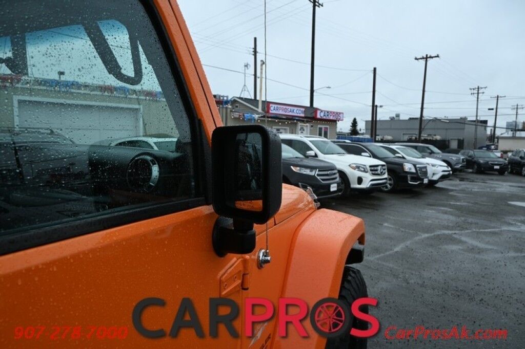 2012 Jeep Wrangler Unlimited Sahara - 4x4 - Remote Start - 3.6L V6 - Leather & Heated Seats - Power WIndows & Locks - Keyless Entry - Infinty Sound System - NAV - Bluetooth - Winch Ready Bumper w/ 20 Lightbar - Color Matched Hard Top - American Outlaw Wheels - Tow Pkg Anchorage AK