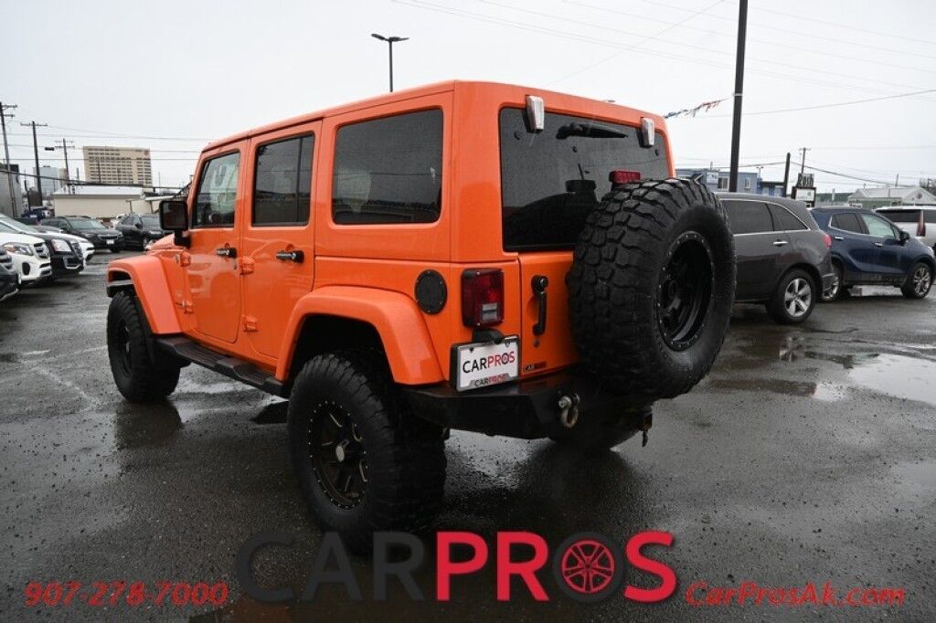 2012 Jeep Wrangler Unlimited Sahara - 4x4 - Remote Start - 3.6L V6 - Leather & Heated Seats - Power WIndows & Locks - Keyless Entry - Infinty Sound System - NAV - Bluetooth - Winch Ready Bumper w/ 20 Lightbar - Color Matched Hard Top - American Outlaw Wheels - Tow Pkg Anchorage AK
