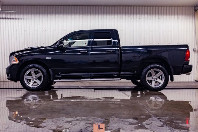 2012 Ram 1500 4x4 Quad Cab Sport HEMI Red Deer AB