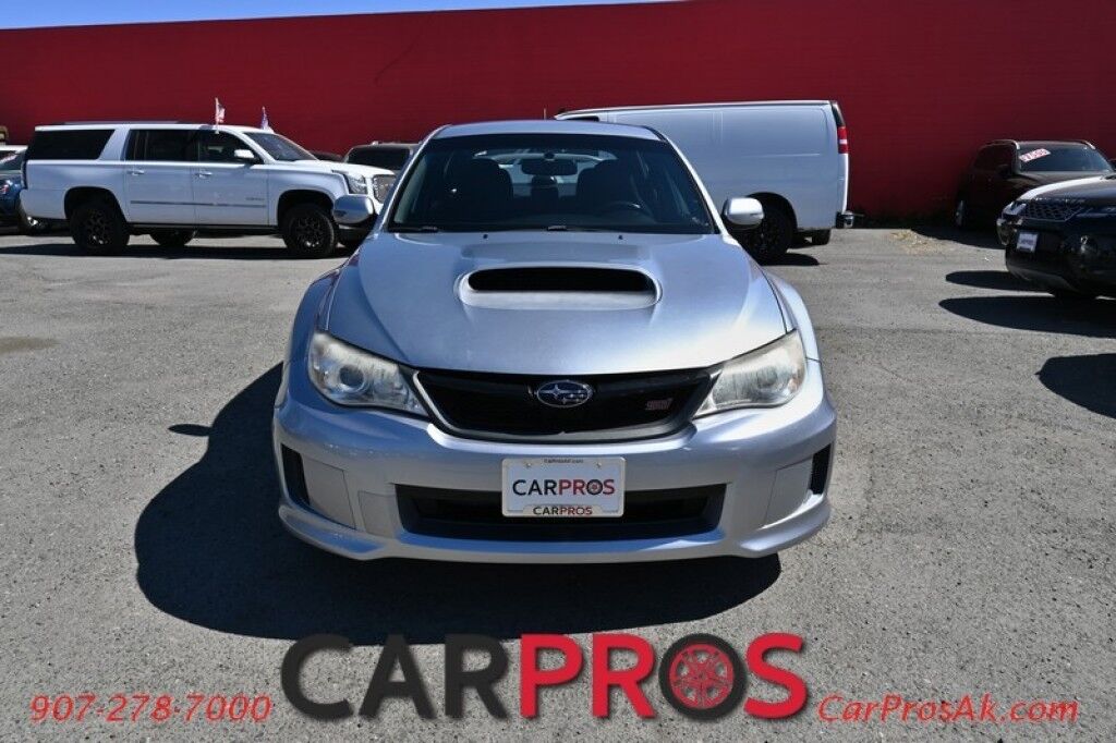 2012 Subaru Impreza Sedan WRX STI - AWD - 2.5l DOHC Intercooled Turbo Engine - 6-speed manaual - Sti Short Throw Shifter - Front Heated Alcantara Bucket Seats - Subwoofer kit - Pioneer Radio - Keyless Entry - 18' STI Wheels