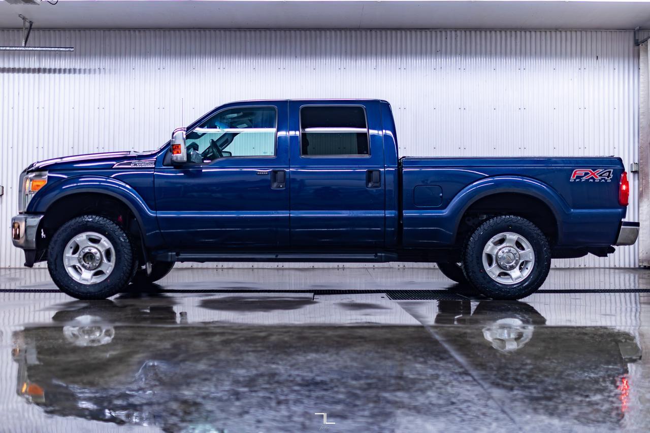 2013 Ford F-250 4x4 Crew Cab XLT FX4 BCam Topper Red Deer AB