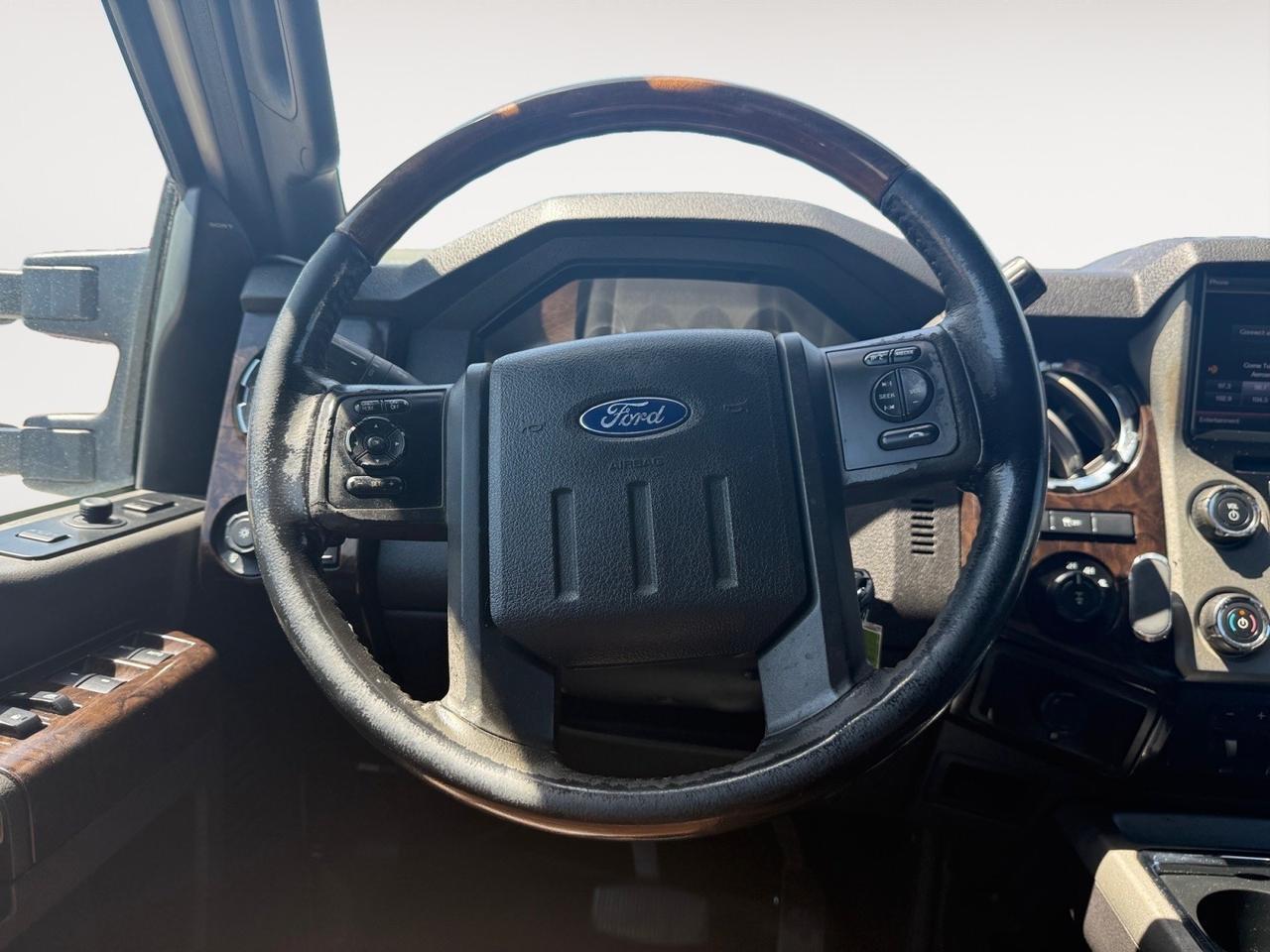 2013 Ford Super Duty F-350 SRW LARIAT, HEATED/VENTILATED SEATS, UNIVERSAL GARAGE DOOR OPENER, BED LINER, TONNEAU COVER, RUNNING BOARDS, SLIDING REAR WINDOW, BACKUP CAMERA, POWER/HEATED MIRRORS, SUNROOF, COME AND TEST DRIVE THIS FORD F-350! Norfolk VA