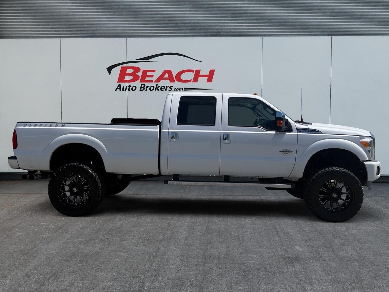 2013 Ford Super Duty F-350 SRW LARIAT, HEATED/VENTILATED SEATS, UNIVERSAL GARAGE DOOR OPENER, BED LINER, TONNEAU COVER, RUNNING BOARDS, SLIDING REAR WINDOW, BACKUP CAMERA, POWER/HEATED MIRRORS, SUNROOF, COME AND TEST DRIVE THIS FORD F-350! Norfolk VA