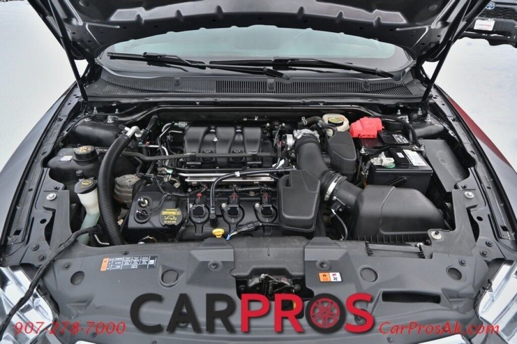 2013 Ford Taurus SEL - Keyless Entry - Remote Start - Dual Exhaust - Power Driver and Passenger Seats - Block Heater - 6 Speed Automatic Transmission - Curve Control - CD Player - Spare Tire - Flex Fuel Anchorage AK