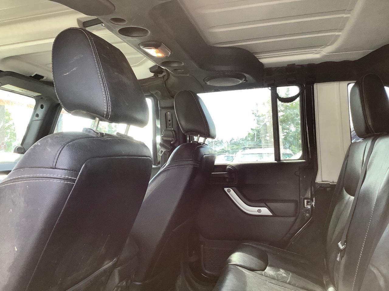 2013 Jeep Wrangler Unlimited Sahara Hayden ID