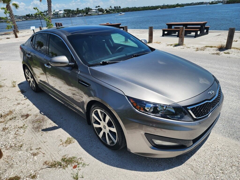 2013 Kia Optima SX w/Limited Pkg~LOW MILES~BLUETOOTH~CRUISE CONTROL~FOG LIGTHS~NAVIGATION SYSTEM~PANORAMIC MOONROOF / SUNROOF~REARVIEW CAMERA Sarasota FL