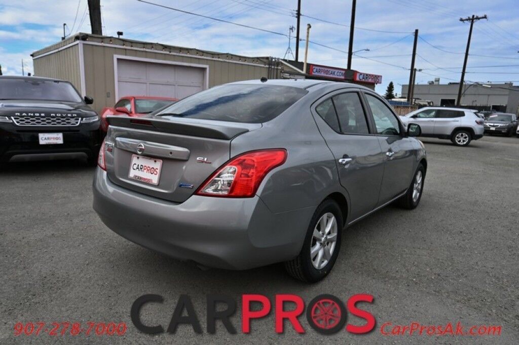 2013 Nissan Versa FWD - 1.6L 4-Cyl - Automatic - Premium Cloth Seats - Power Locks, Windows & Mirrors - Keyless Entry & Push To Start - Steering Wheel Audio Controls - AM/FM & CD Player - Aluminum Wheels - 38 MPG - 1-Owner Anchorage AK
