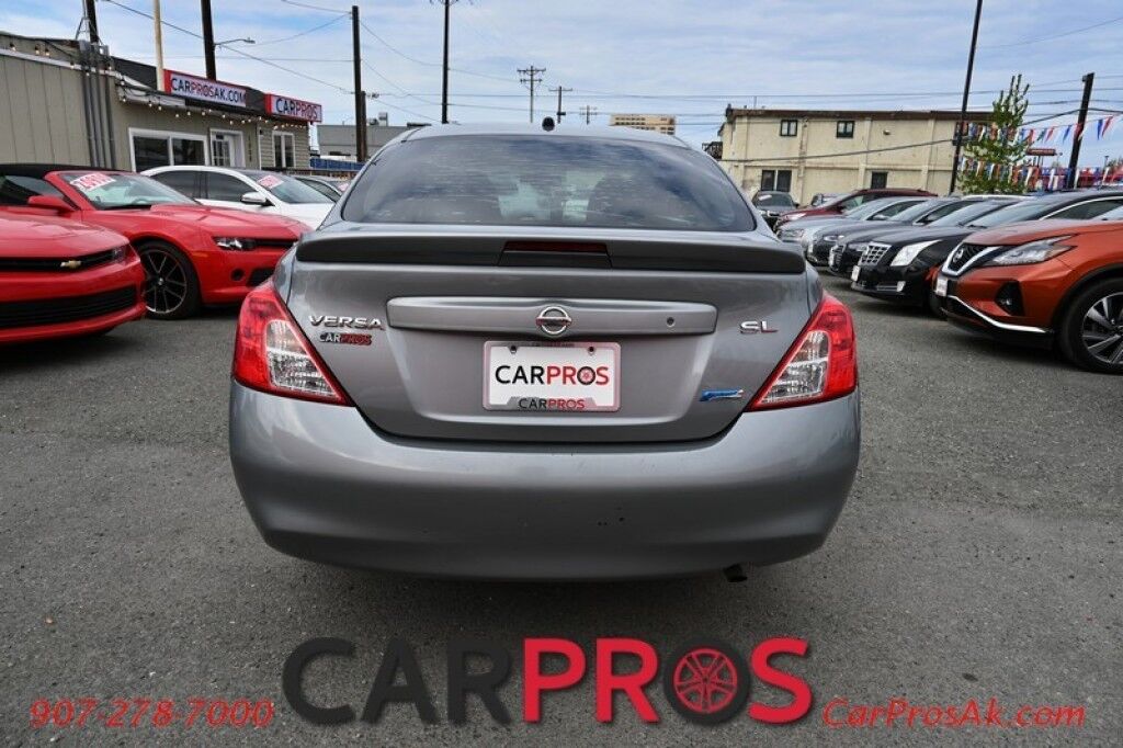 2013 Nissan Versa FWD - 1.6L 4-Cyl - Automatic - Premium Cloth Seats - Power Locks, Windows & Mirrors - Keyless Entry & Push To Start - Steering Wheel Audio Controls - AM/FM & CD Player - Aluminum Wheels - 38 MPG - 1-Owner Anchorage AK