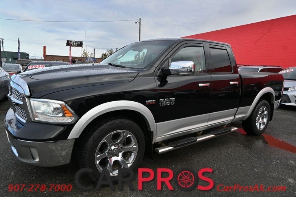 2013 Ram 1500 Laramie - 5.7L V8 - Quad Cab - 4X4 - Remote Start - Powered Heated/Cooled Seats - Heated Steering Wheel - Bluetooth - Navigation - Backup Camera - Bedliner - Tonneau Cover - Tow Package