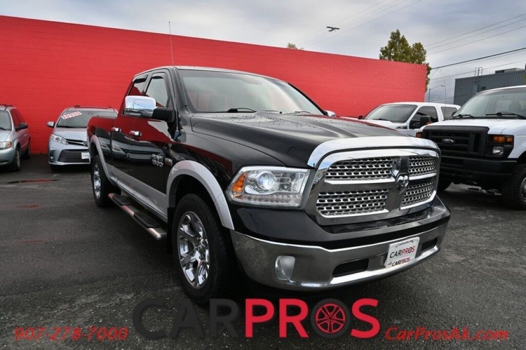 2013 Ram 1500 Laramie - 5.7L V8 - Quad Cab - 4X4 - Remote Start - Powered Heated/Cooled Seats - Heated Steering Wheel - Bluetooth - Navigation - Backup Camera - Bedliner - Tonneau Cover - Tow Package